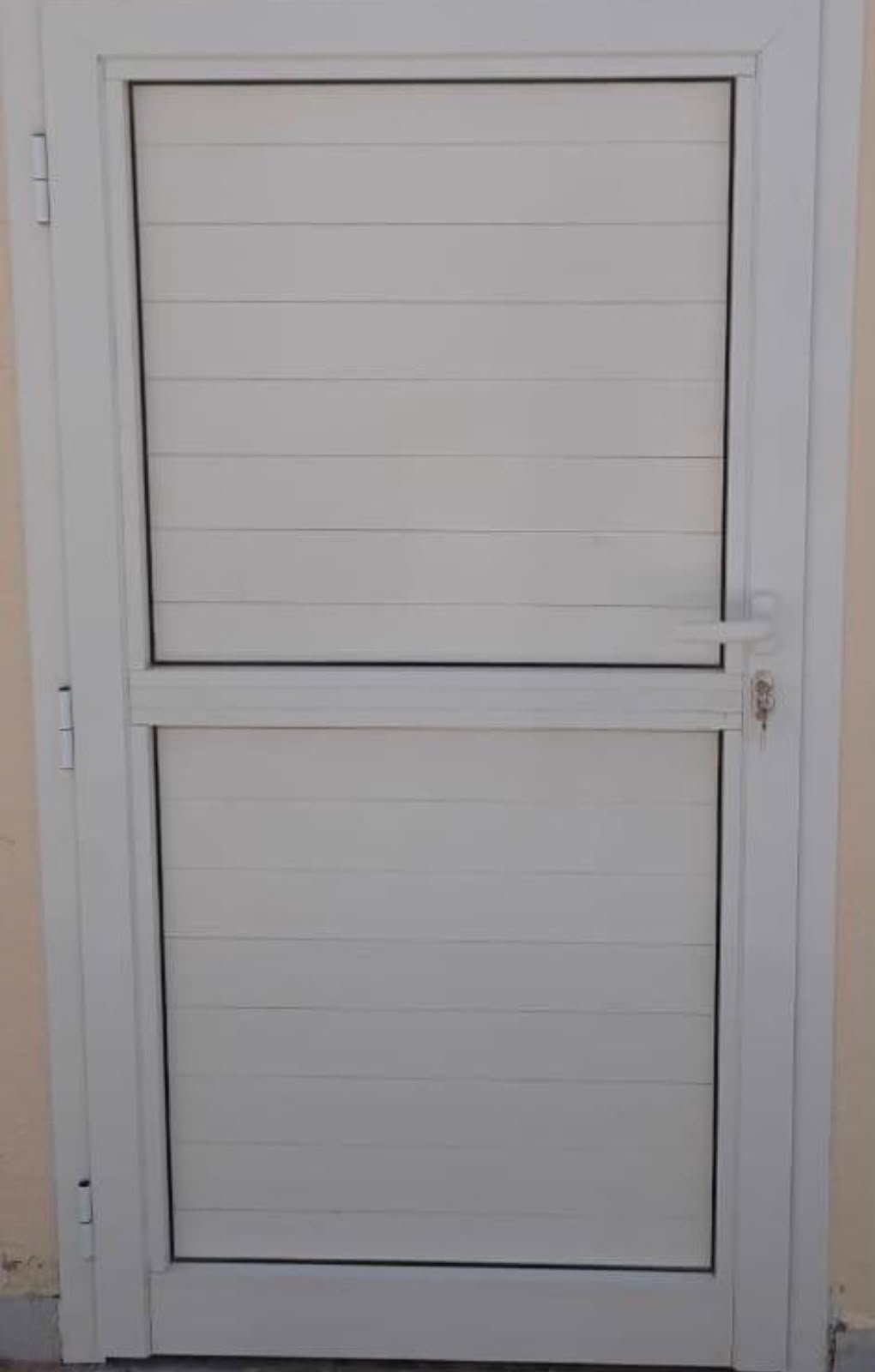 Aluminium door installation in Abu Dhabi