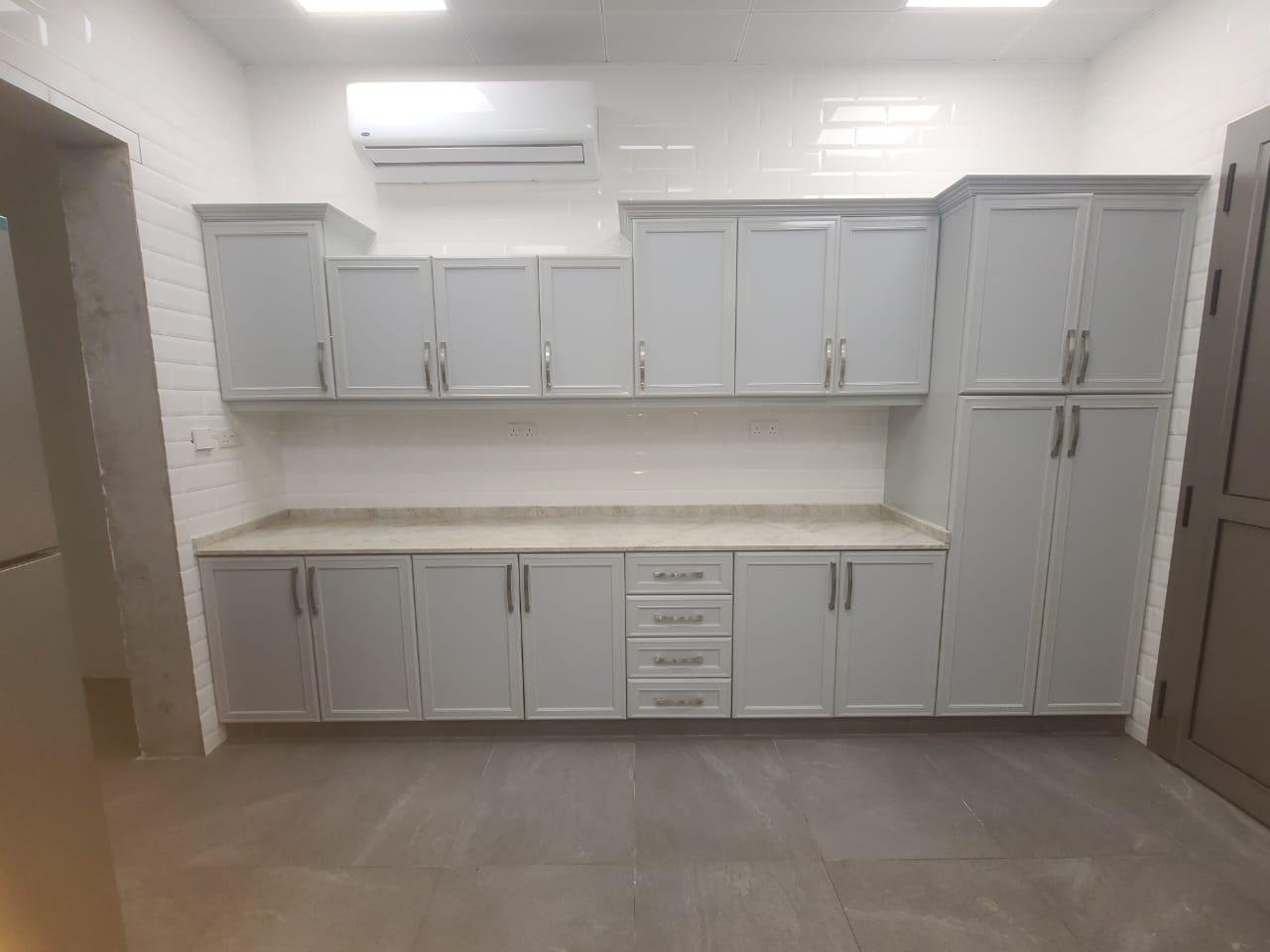 Aluminium kitchen cabinet design installed by A R Aluminium and Glass in an Abu Dhabi villa